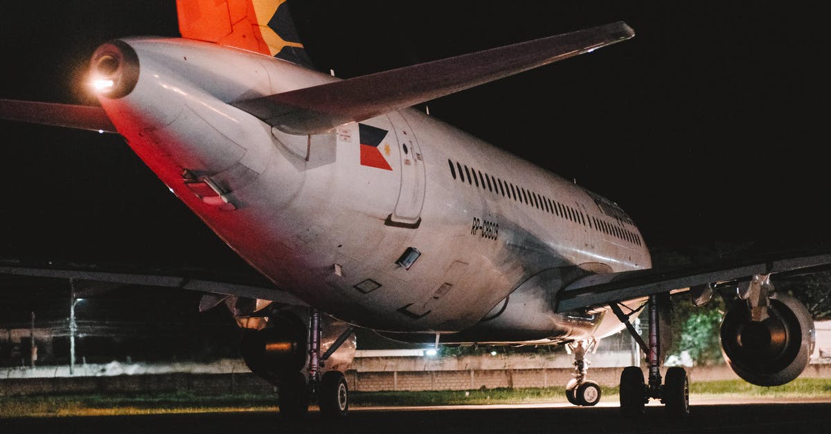 How can I reach Prague airport during the night hours? - White and Red Passenger Plane How can I reach Prague airport during the night hours? - White and Red Passenger Plane