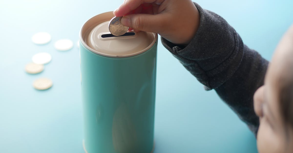 How can I visit Chernobyl? - A Person Putting Money in a Can How can I visit Chernobyl? - A Person Putting Money in a Can