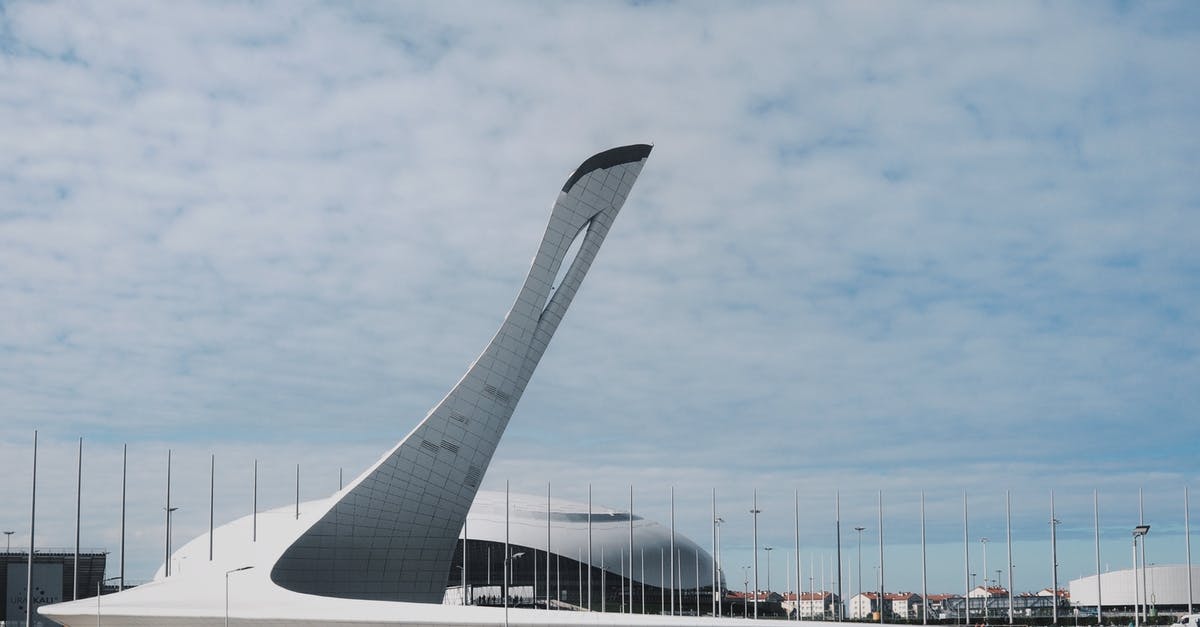 How can I withdraw RMBs at Hong Kong airport (HKG)? - White and Gray Building Under Blue Sky How can I withdraw RMBs at Hong Kong airport (HKG)? - White and Gray Building Under Blue Sky