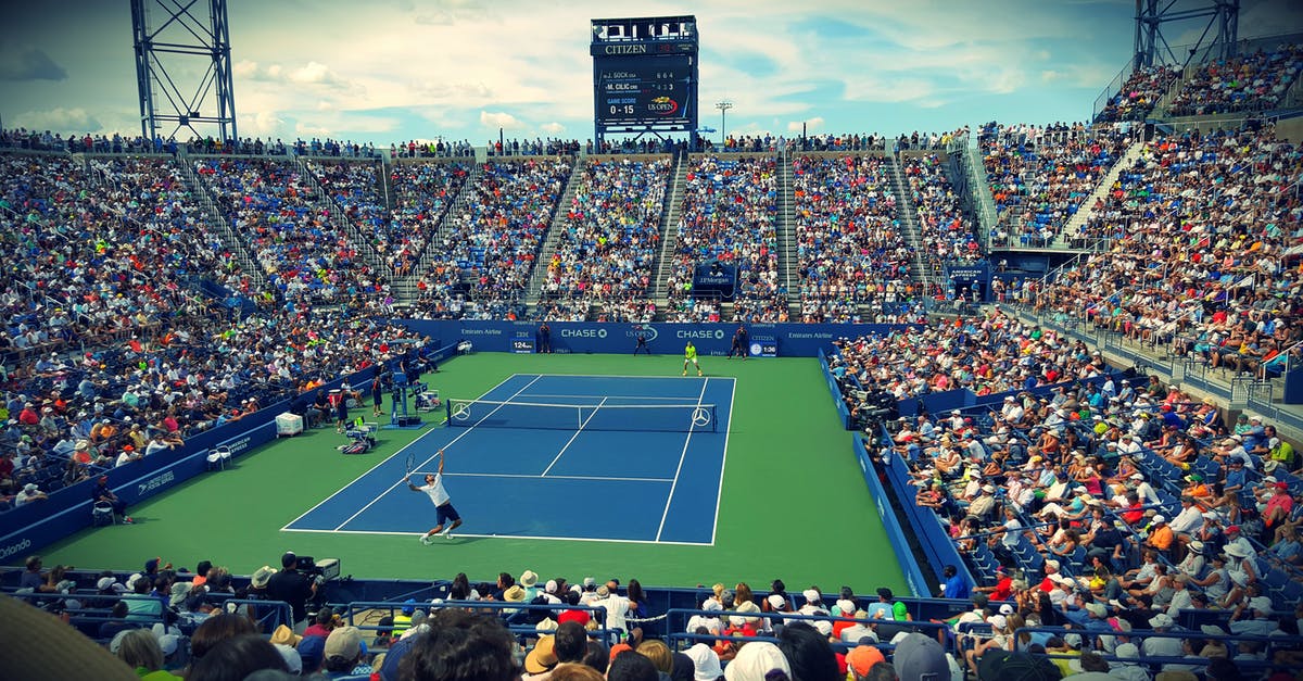 How can I witness a United States Supreme Court session? - People Sitting on Bench Watching Tennis Event on Field during Daytime