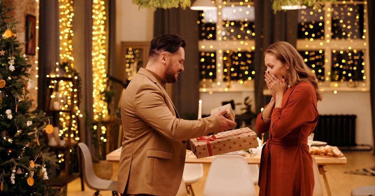 How can my Thai wife get a UK visa? - Man Giving Christmas Presents to His Wife How can my Thai wife get a UK visa? - Man Giving Christmas Presents to His Wife