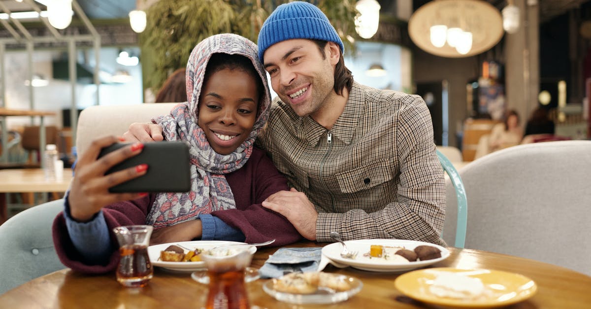 How can my Thai wife get a UK visa? - Couple Taking Selfie While Eating How can my Thai wife get a UK visa? - Couple Taking Selfie While Eating