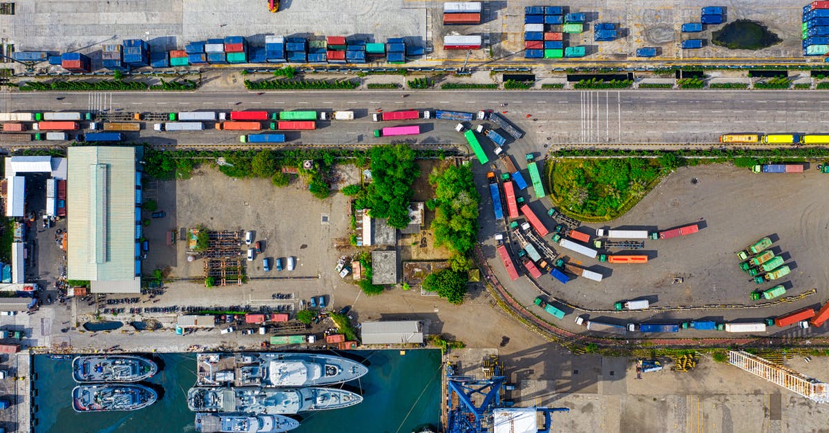 How can Norwegian Customs know who repaired their boats abroad? - High Angle Shot of Colorful Trucks How can Norwegian Customs know who repaired their boats abroad? - High Angle Shot of Colorful Trucks
