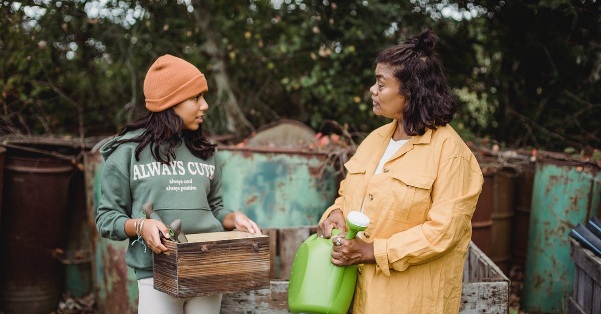 How can the mother of an EU citizen quickly receive a UK visa? - Ethnic woman with watering can speaking with teen near metal containers while looking at each other on farm How can the mother of an EU citizen quickly receive a UK visa? - Ethnic woman with watering can speaking with teen near metal containers while looking at each other on farm
