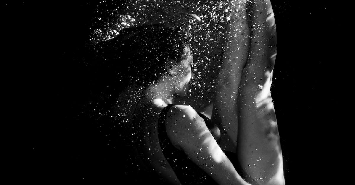 How common are onsen that require swimming costumes in Japan? - Grayscale Photo of Womans Hand How common are onsen that require swimming costumes in Japan? - Grayscale Photo of Womans Hand
