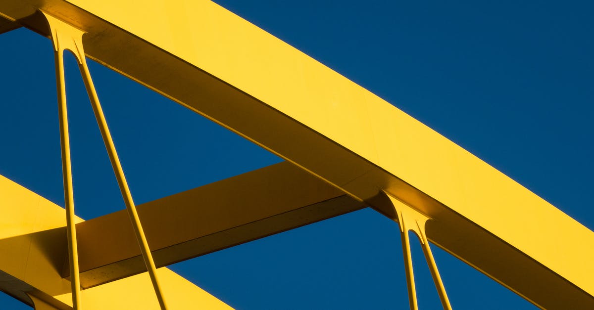 How common is it for large bridges or bridge-tunnel complexes to not have toll? [closed] - Arch of a Yellow Bridge