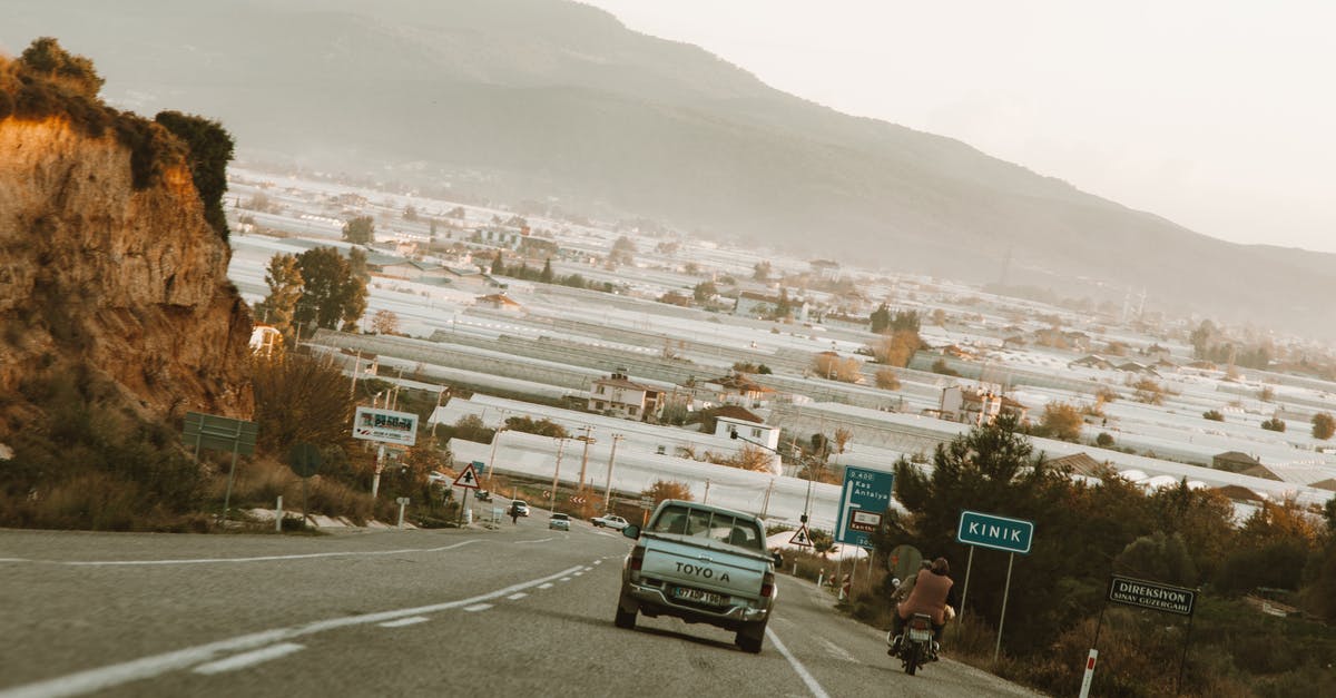 How could a Washington registered car travel to Zürich? - Black Suv on Road How could a Washington registered car travel to Zürich? - Black Suv on Road