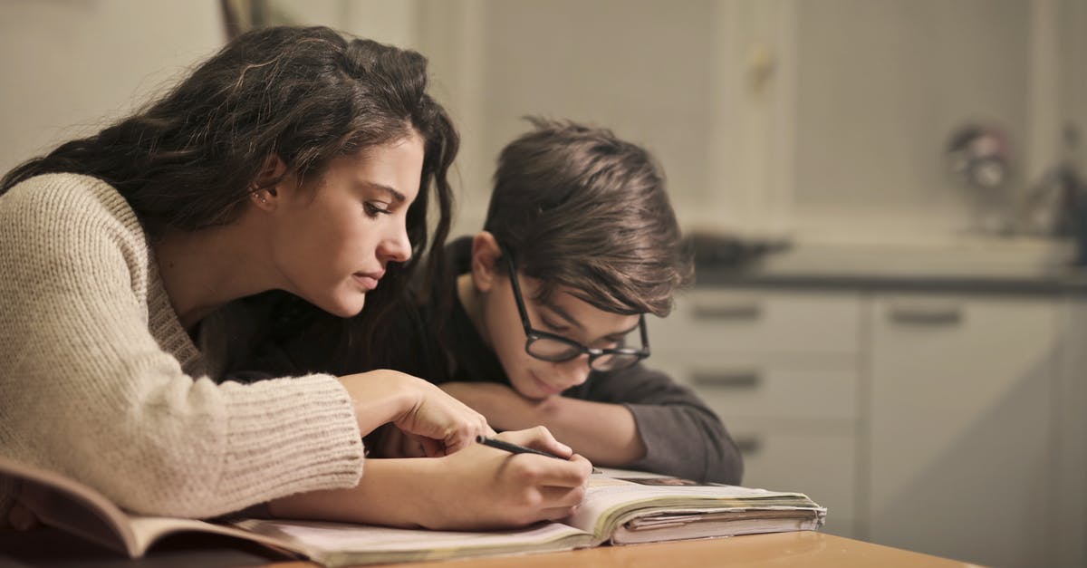 How do family members earn points in Qantas Frequent Flyer? - Focused students doing homework at home How do family members earn points in Qantas Frequent Flyer? - Focused students doing homework at home