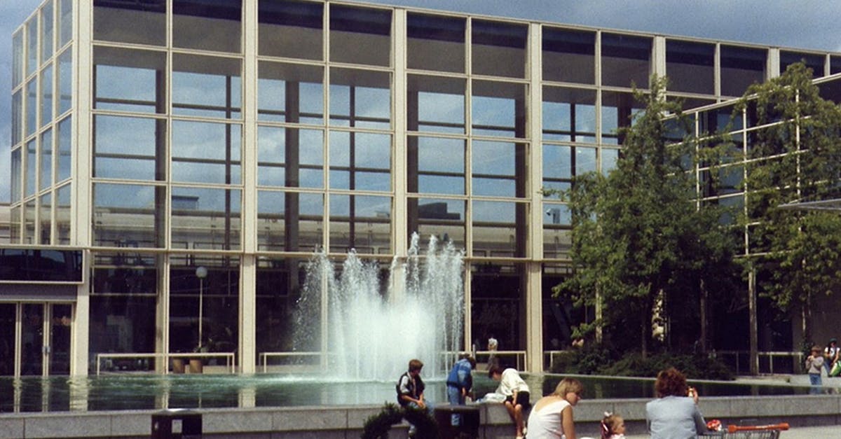 How do Group Appointments work at TLScontact centres for UK Visitor Visa? - People Sitting on Bench Near Water Fountain How do Group Appointments work at TLScontact centres for UK Visitor Visa? - People Sitting on Bench Near Water Fountain