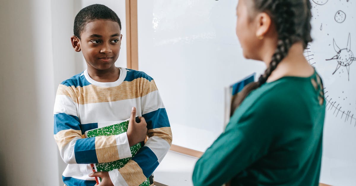 How do I answer UK visa question about other savings or income? - Diverse little classmates speaking near whiteboard during lesson at school How do I answer UK visa question about other savings or income? - Diverse little classmates speaking near whiteboard during lesson at school