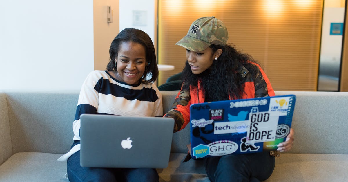 How do I avoid snoring when sharing a room in a hostel or lodge? - Two Woman Sitting On Sofa While Using Laptops How do I avoid snoring when sharing a room in a hostel or lodge? - Two Woman Sitting On Sofa While Using Laptops