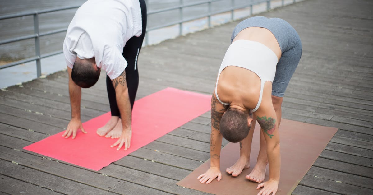 How do I find out when advance tickets become available for GB trains? - Woman in White Tank Top and Gray Leggings Doing Yoga on Pink Yoga Mat