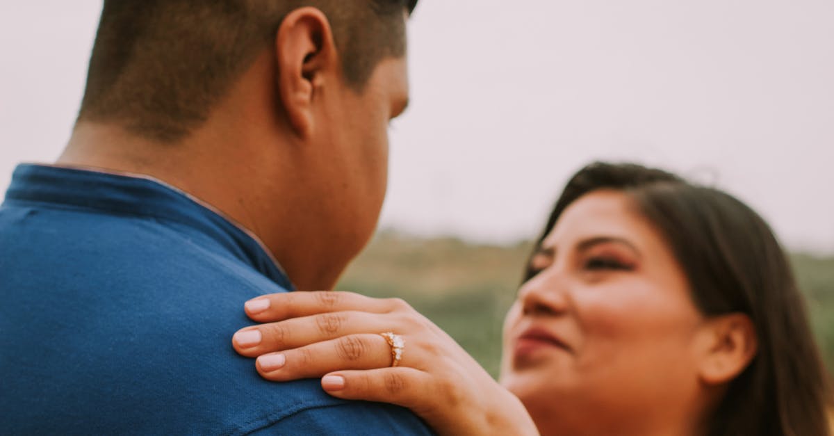 How do I get an engagement ring past security/customs in an airport without alerting my significant other? - Smiling woman with beloved man in nature How do I get an engagement ring past security/customs in an airport without alerting my significant other? - Smiling woman with beloved man in nature