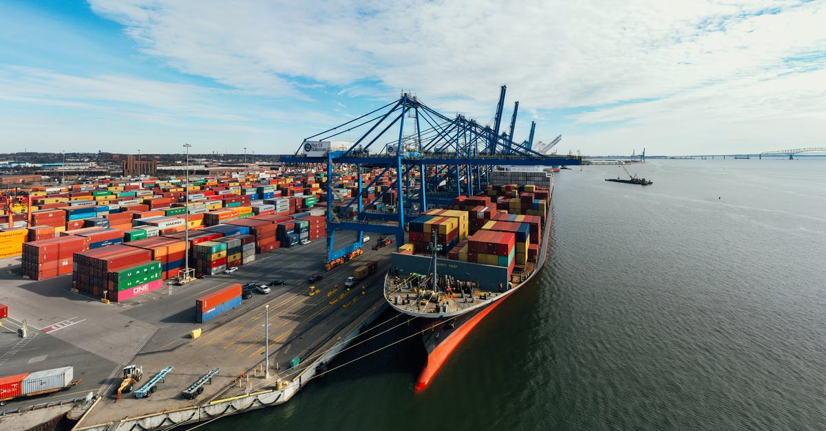 How do I get from Cairo Airport to Port Said with 2 large 20kg bags? - Cargo ship at unloading containers How do I get from Cairo Airport to Port Said with 2 large 20kg bags? - Cargo ship at unloading containers