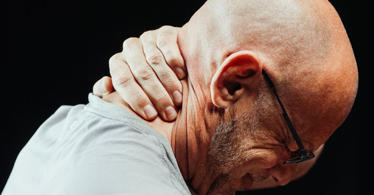 How Do I Handle Getting Injured Or Ill While Moving Out Of State (in USA) [closed] - Close-Up Photo of a Man Having a Neck Pain