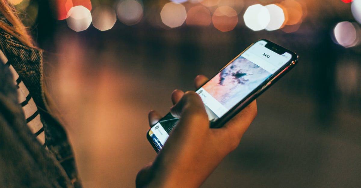How do I make sure I'm not charged by my mobile carrier? [closed] - Person Holding Space Gray Iphone X