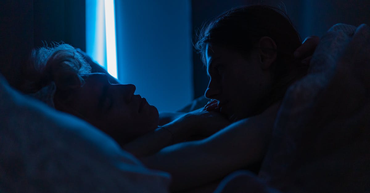 How do I purchase tickets for the Night Riviera sleeping compartment? - A Man Looking at his Partner while Sleeping