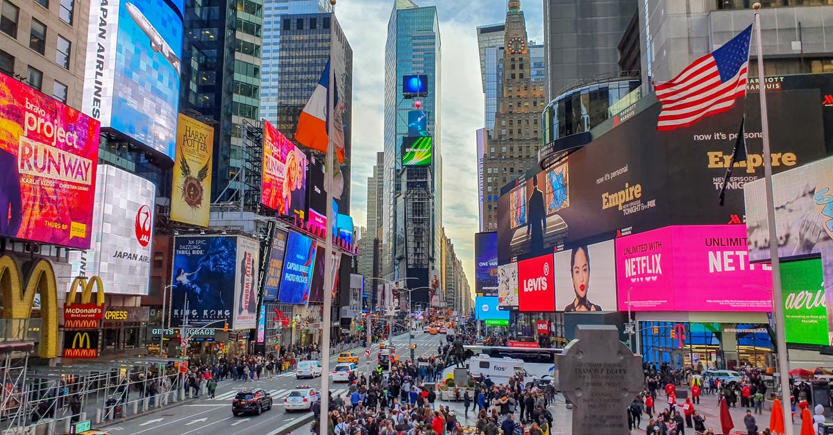 How do I request USA visa for brazilian people? - People Walking on Street