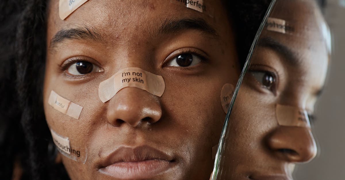 How do I reset the TSA-unlocked indicator on my lock? - A Woman Protesting with Messages on Band Aids How do I reset the TSA-unlocked indicator on my lock? - A Woman Protesting with Messages on Band Aids