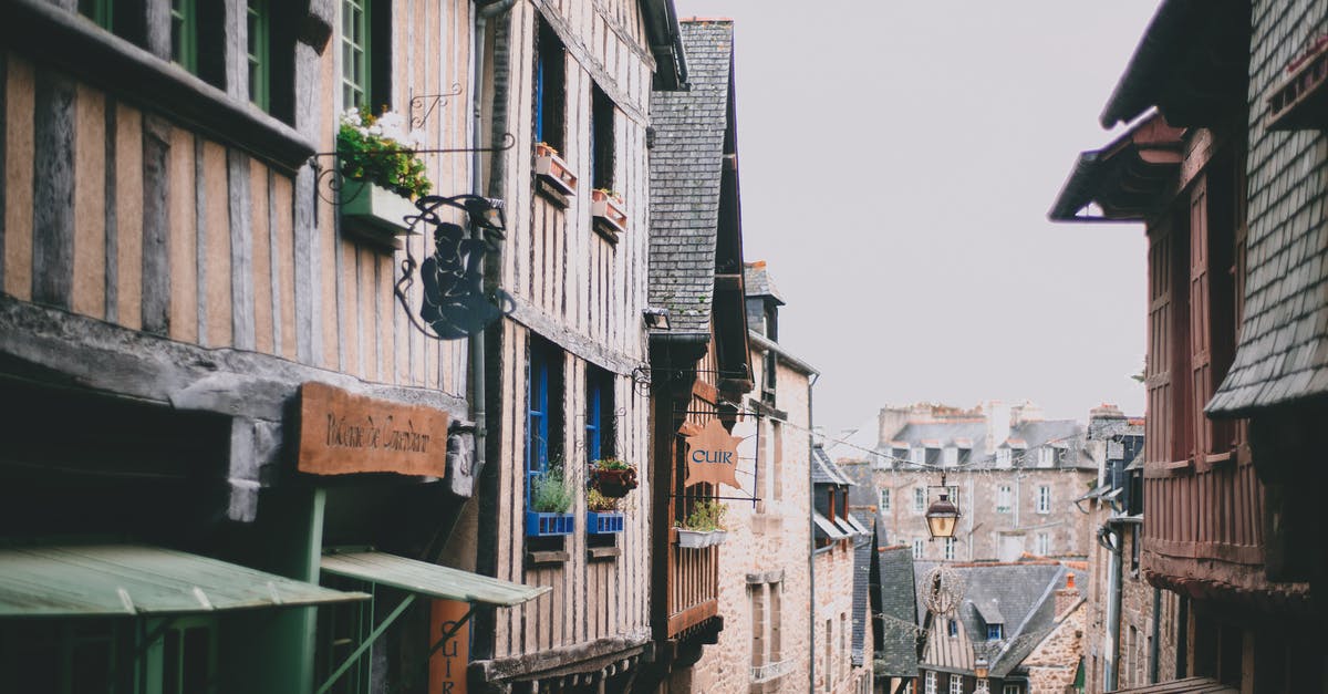 How do I return to Germany with an exisiting residence permit after an internship in Japan? [closed] - Narrow street with old authentic buildings