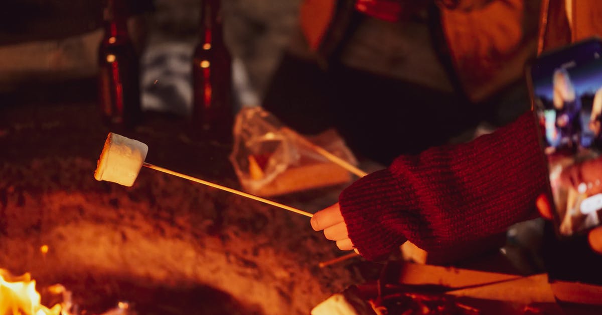 How do I roast a marshmallow over lava in Iceland? - Person Roasting Marshmallow How do I roast a marshmallow over lava in Iceland? - Person Roasting Marshmallow