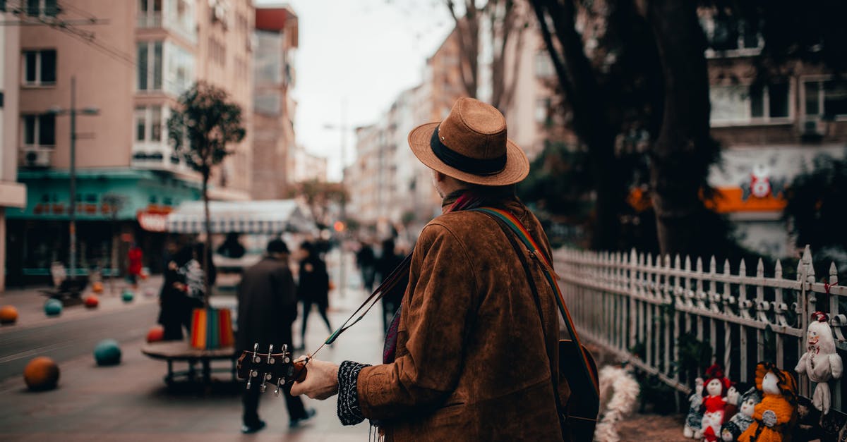 How do I travel with musical instruments? - Person Playing Brown Ukulele How do I travel with musical instruments? - Person Playing Brown Ukulele