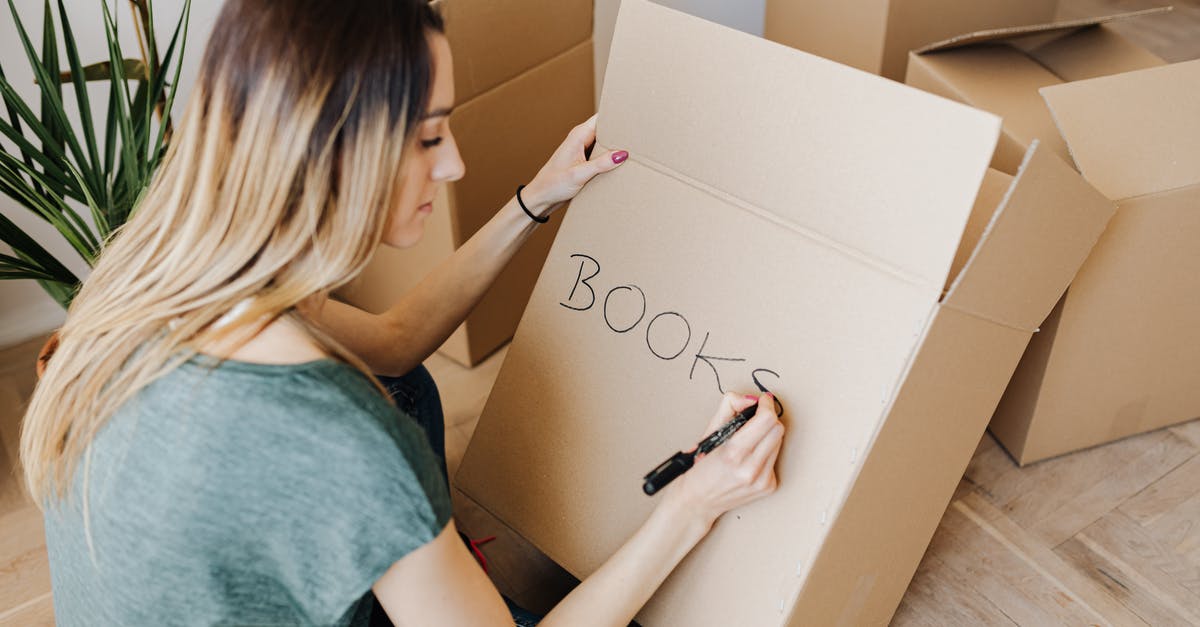 How do you book an Emirates Dubai stopover package (from US/Canada)? - Content woman writing on cardboard container word book How do you book an Emirates Dubai stopover package (from US/Canada)? - Content woman writing on cardboard container word book