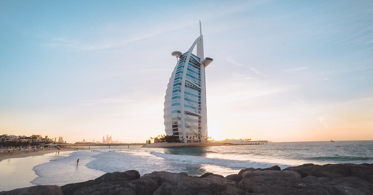 How do you book an Emirates Dubai stopover package (from US/Canada)? - Waving sea splashing near sandy and rocky beach How do you book an Emirates Dubai stopover package (from US/Canada)? - Waving sea splashing near sandy and rocky beach
