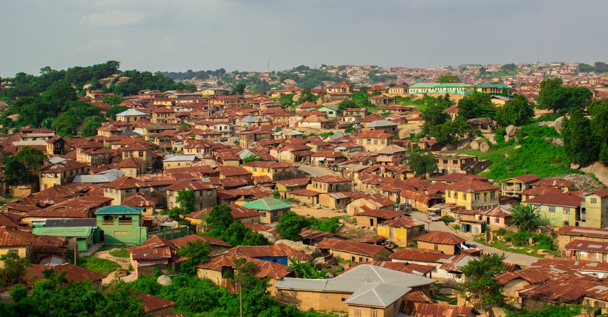 How do you find “issued by” and “issued in” on a Nigeria passport? It’s required for a visa application - Top View of Houses and Building Roofs