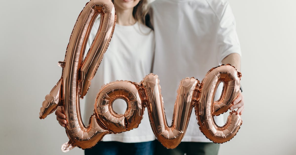 How do you get air miles? - Man in White Crew Neck T-shirt Holding Brown and White Heart Shaped Ring How do you get air miles? - Man in White Crew Neck T-shirt Holding Brown and White Heart Shaped Ring
