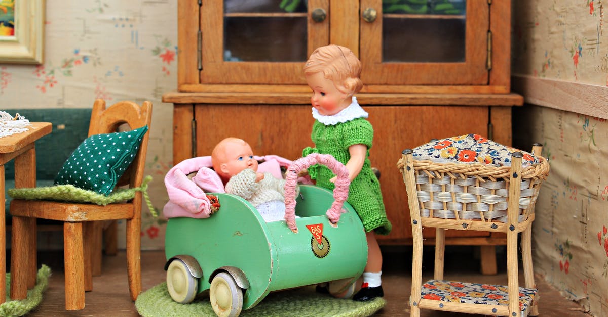 How do you seat a baby securely on a coach transfer? - Brown Haired Girl Doll Holding Baby in Bassinet Doll How do you seat a baby securely on a coach transfer? - Brown Haired Girl Doll Holding Baby in Bassinet Doll