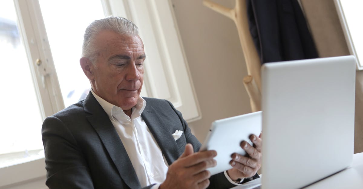 How does 90/180 rule work while holding a Schengen residence? - Man in Black Suit Jacket Using Tablet How does 90/180 rule work while holding a Schengen residence? - Man in Black Suit Jacket Using Tablet
