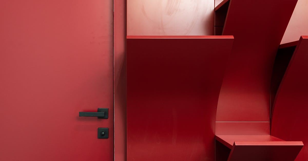 How does an airline/ground handling company send a notification to Russian authorities? - Interior of modern office with red door next to empty shelves near wall