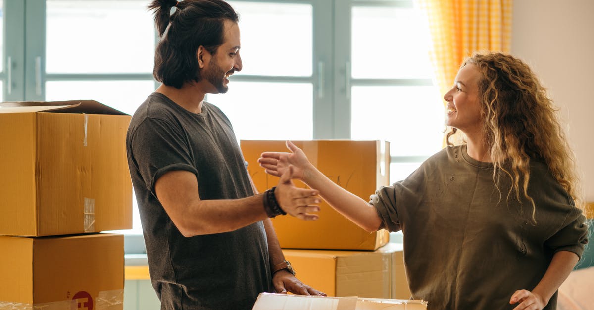 How does one not get hassled for duties/taxes for items that aren't new but look new? - Happy diverse couple among carton boxes in new home How does one not get hassled for duties/taxes for items that aren't new but look new? - Happy diverse couple among carton boxes in new home