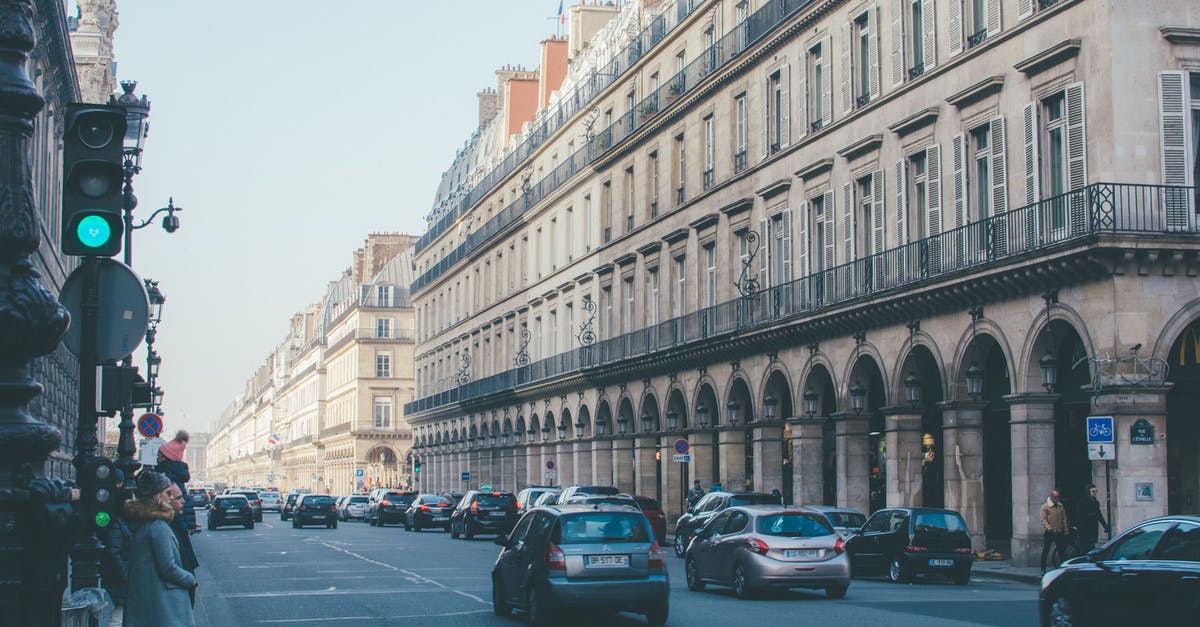 How does the Paris Disneyland Fastpass system work? - Vehicles on Road Beside Buildings How does the Paris Disneyland Fastpass system work? - Vehicles on Road Beside Buildings