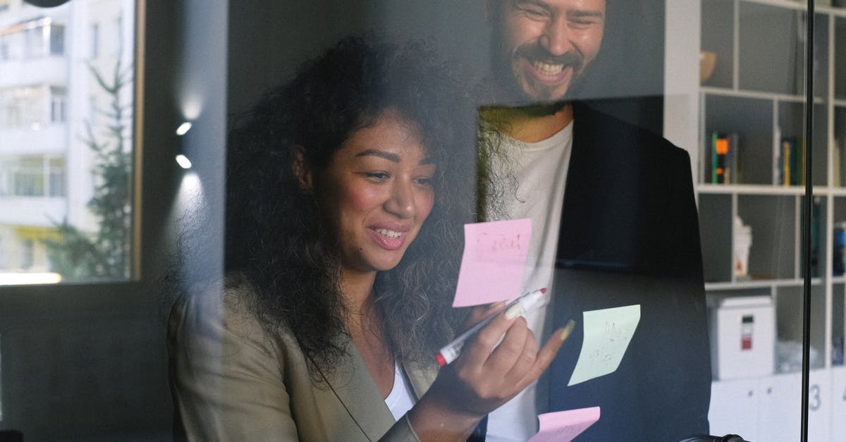 How does TSA ensure only Pre-Checked passengers go through Pre-Check? - Diverse happy business partners checking stickers on glass door and smiling together in office How does TSA ensure only Pre-Checked passengers go through Pre-Check? - Diverse happy business partners checking stickers on glass door and smiling together in office