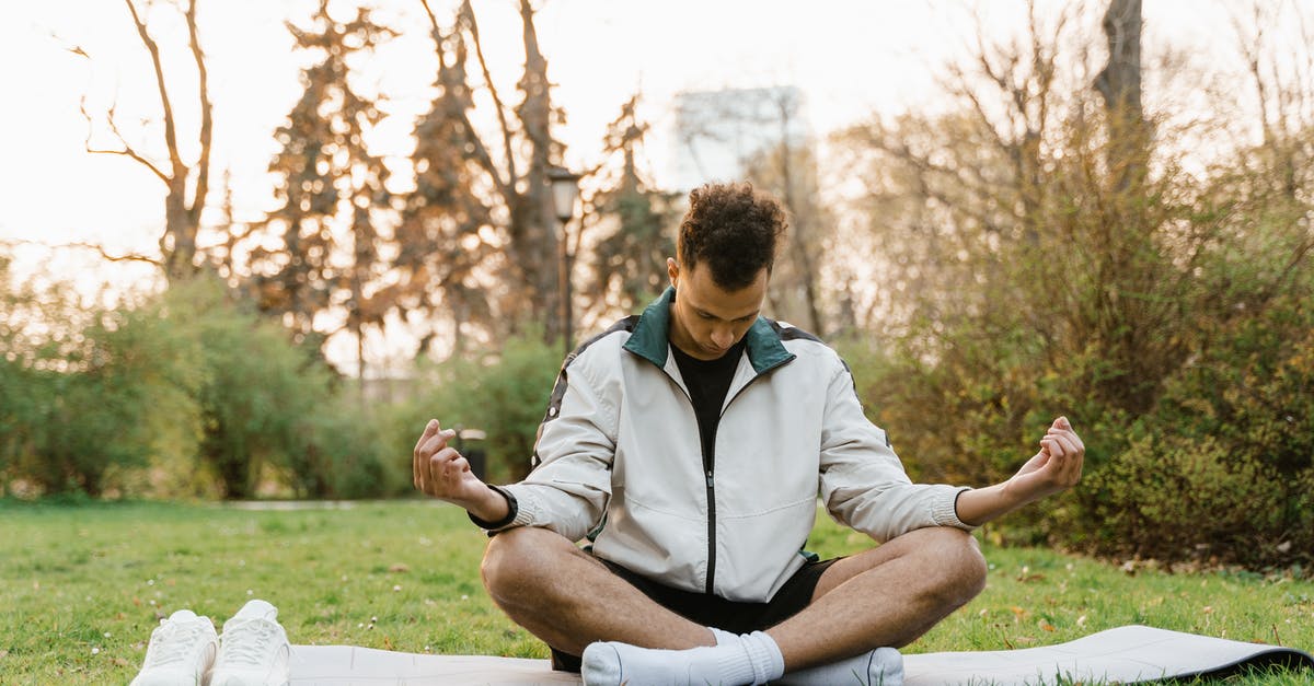 How easy is it to park in Rimini in August? - A Man Meditating at a Park How easy is it to park in Rimini in August? - A Man Meditating at a Park