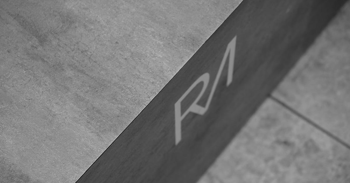 How easy/hard is it to backpack to Taiwan knowing only English? - Grayscale Photo of Initials On Concrete Surface How easy/hard is it to backpack to Taiwan knowing only English? - Grayscale Photo of Initials On Concrete Surface
