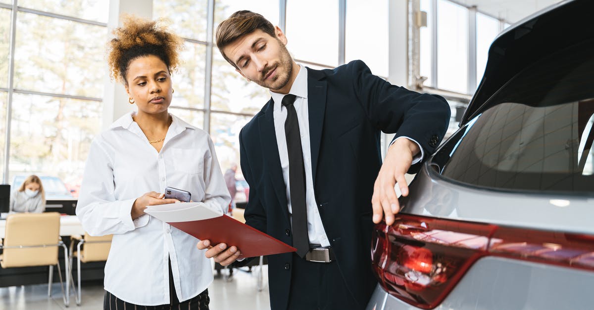 How efficient is the immigration service at Oakland? - Photo of a Salesman Talking to a Customer How efficient is the immigration service at Oakland? - Photo of a Salesman Talking to a Customer
