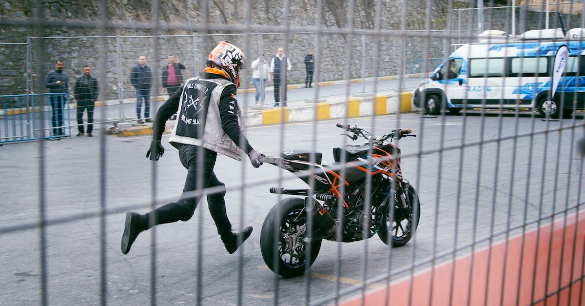 How good are Aeroflot's current safety and performance standards? - Man Holding Orange and Black Sports Bike on Asphalt Road How good are Aeroflot's current safety and performance standards? - Man Holding Orange and Black Sports Bike on Asphalt Road