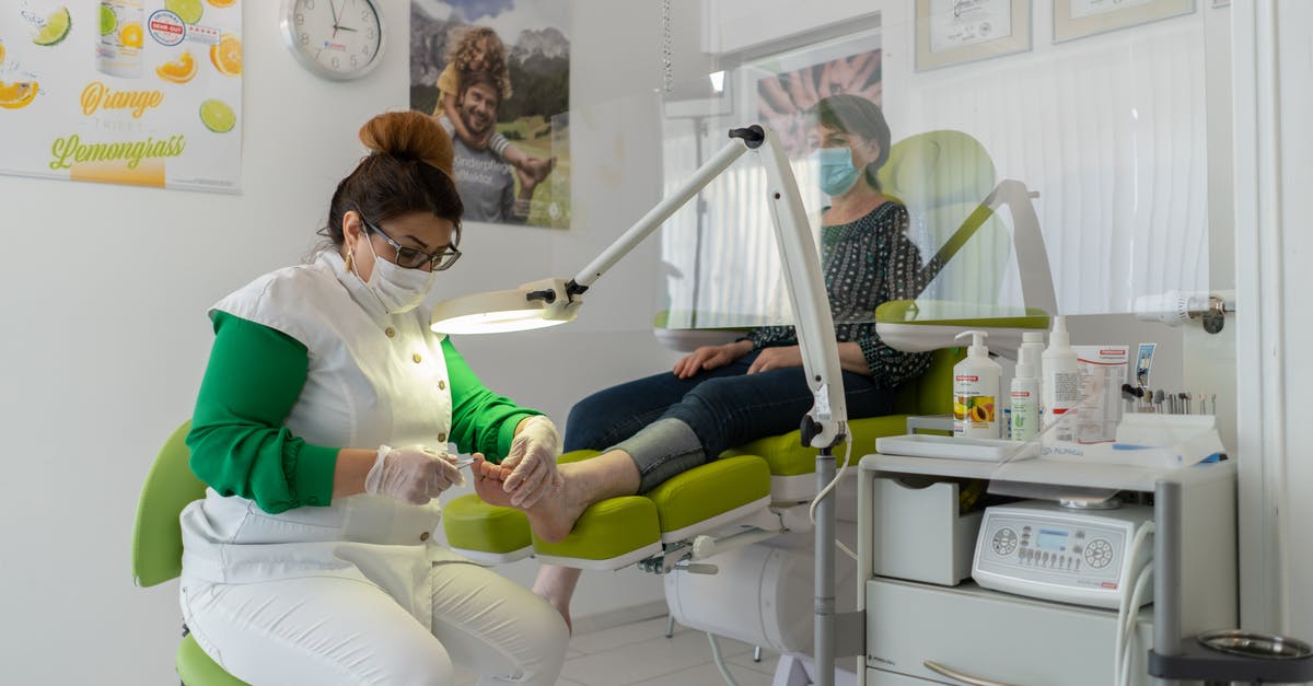 How impairing are current Australian quarantine procedures? - Concentrated professional beauty master in protective mask and gloves doing pedicure in modern salon How impairing are current Australian quarantine procedures? - Concentrated professional beauty master in protective mask and gloves doing pedicure in modern salon