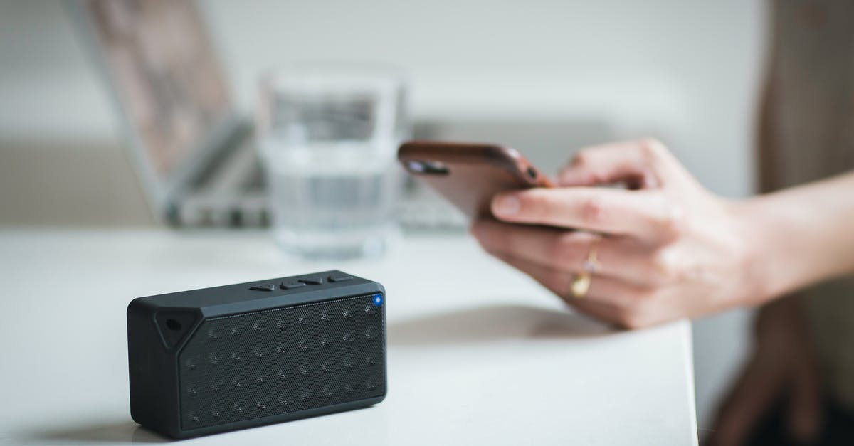 How is it possible for a hotel to have Wifi but no internet access? - Person Holding Iphone Beside Black Portable Speaker How is it possible for a hotel to have Wifi but no internet access? - Person Holding Iphone Beside Black Portable Speaker