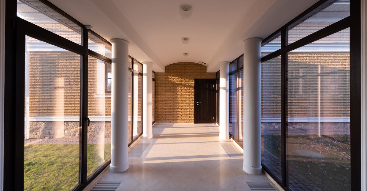 How long can I stay in Canada as a tourist with the new eTA? (italian citizenship) - Corridor of modern building with glass walls How long can I stay in Canada as a tourist with the new eTA? (italian citizenship) - Corridor of modern building with glass walls