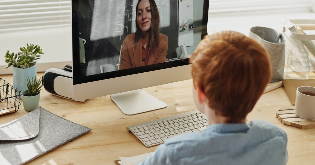 How long can phd students stay in the US after study [closed] - Photo of Boy Video Calling With a Woman