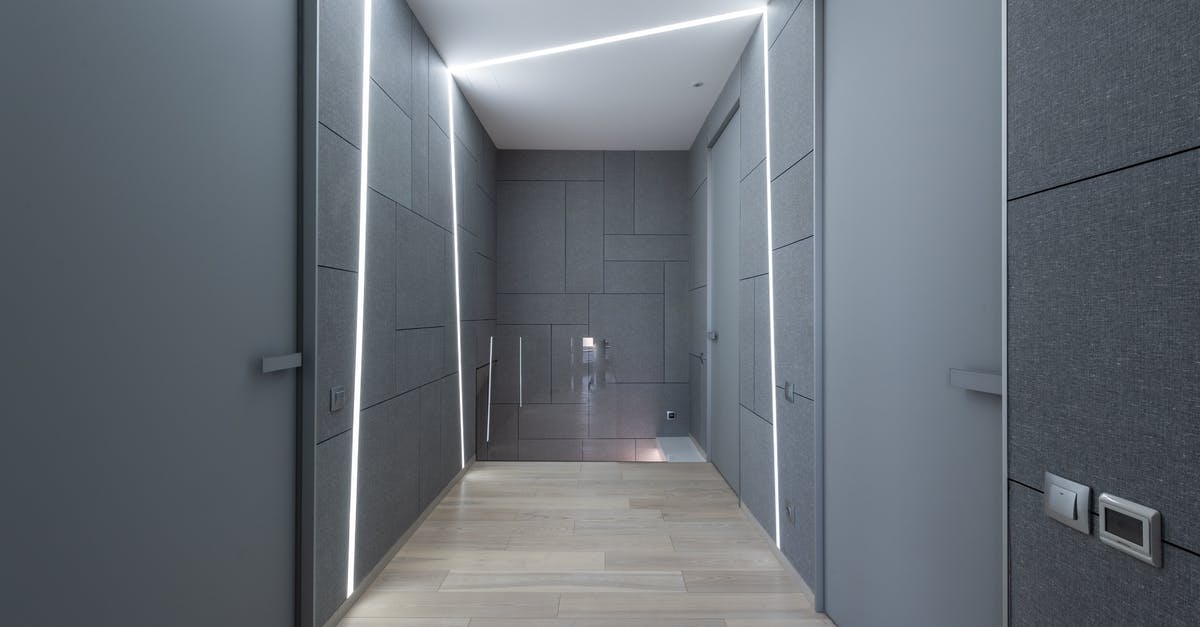 How long does a hotel visa registration last? - Interior of contemporary hallway of creative space with parquet and gray walls with doors and modern bright illumination on ceiling and walls How long does a hotel visa registration last? - Interior of contemporary hallway of creative space with parquet and gray walls with doors and modern bright illumination on ceiling and walls