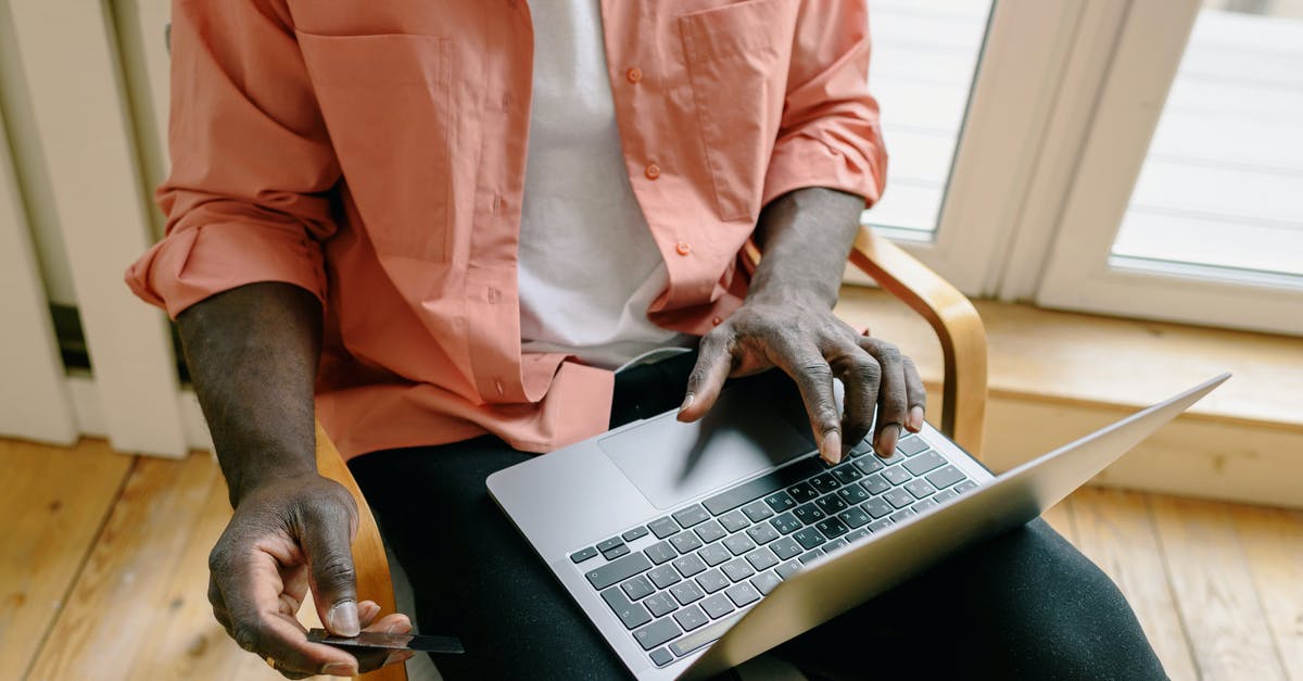 How long does a Ryanair payment stay pending? - A Man Sitting on a Wooden Chair Shopping Online How long does a Ryanair payment stay pending? - A Man Sitting on a Wooden Chair Shopping Online