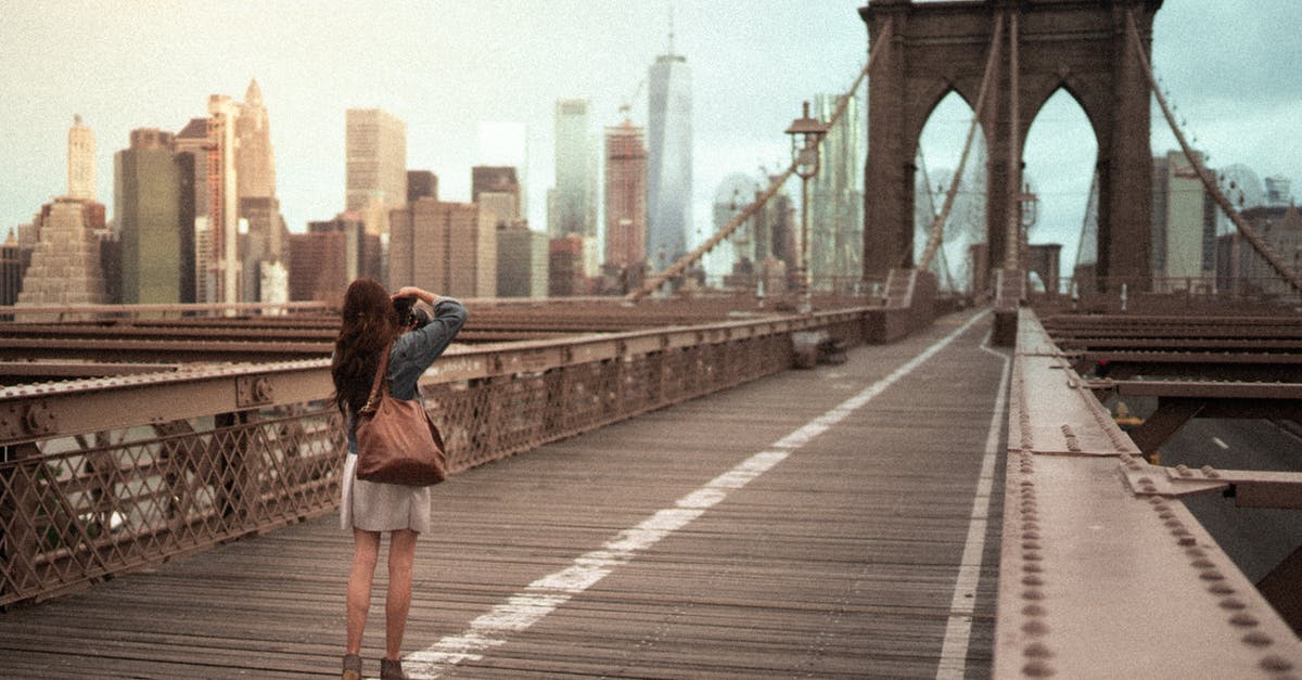 How long does the US Visa Waiver ban for people who travelled to Iran last? - Photo Of Woman On Standing On Wooden bridge How long does the US Visa Waiver ban for people who travelled to Iran last? - Photo Of Woman On Standing On Wooden bridge