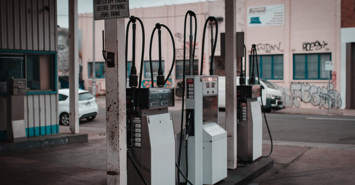How much cash am I supposed to prepay at gas station in the US? - White and Black Gas Pumps How much cash am I supposed to prepay at gas station in the US? - White and Black Gas Pumps