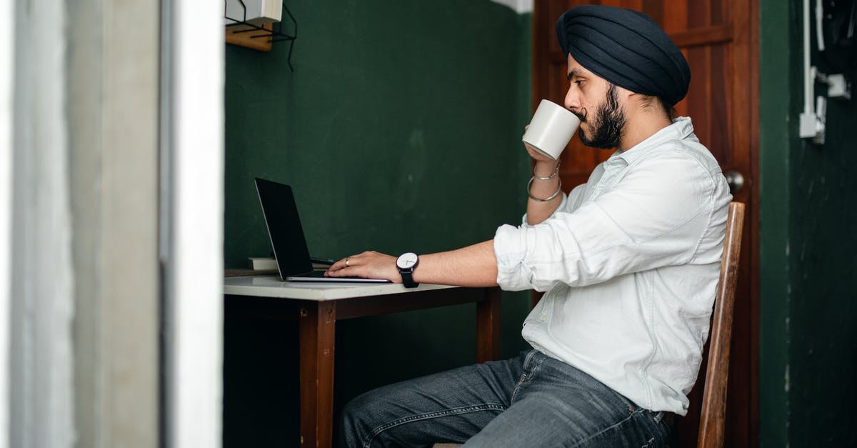 How probable is it to get a short stay visa for France as an Indian inside 3-4 business days? [closed] - Focused ethnic man using netbook and drinking cup of tea