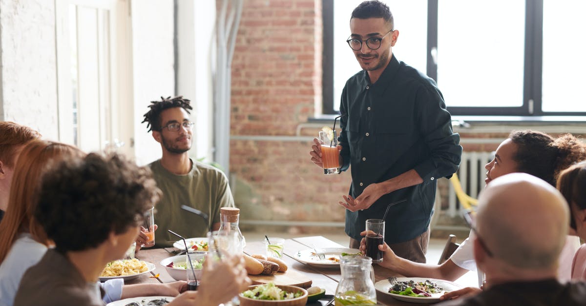 How "cheap" it is not to order drinks together with the meal in the restaurant? - Man Holding a Drink How "cheap" it is not to order drinks together with the meal in the restaurant? - Man Holding a Drink